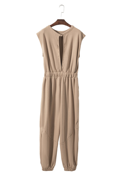 Lichte Franse beige kapmouw open rug trekkoord jogger jumpsuit