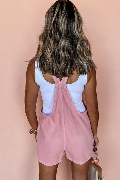 Roze effen denim romper met knoopbandjes en zakken