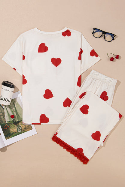 Ensemble pyjama blanc avec t-shirt et pantalon à ourlet en dentelle et imprimé cœur pour la Saint-Valentin