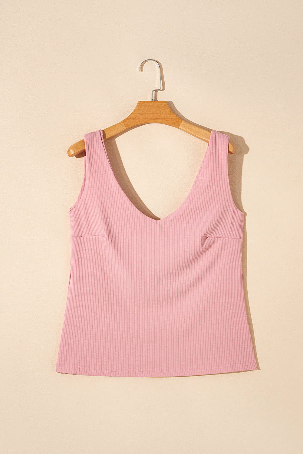 Lichtroze tanktop met ribstructuur en V-hals