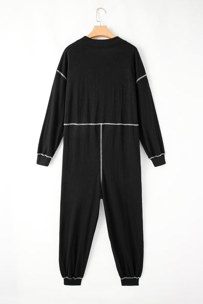 Zwarte flatlock naaddetail V-hals baggy jumpsuit