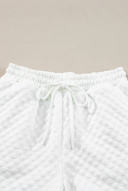 Witte getextureerde V-hals shorts met trekkoord