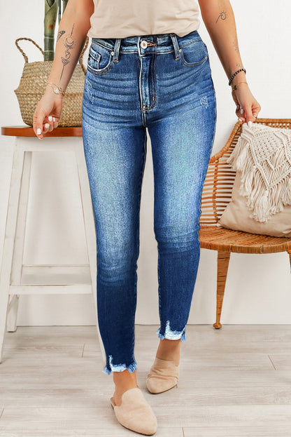 Blauwe skinny jeans met ruwe zoom tot op de enkel