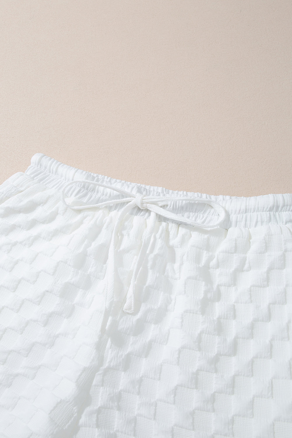 Set van witte top met splithals en trekkoordshorts