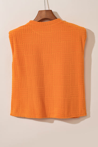 Set van oranje getextureerd tanktopje en wijde broek