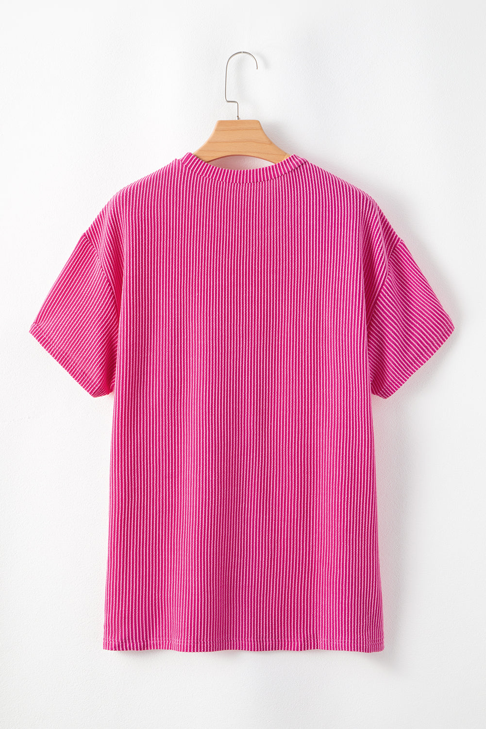 Roze gebreid T-shirt met losse pasvorm en zakken