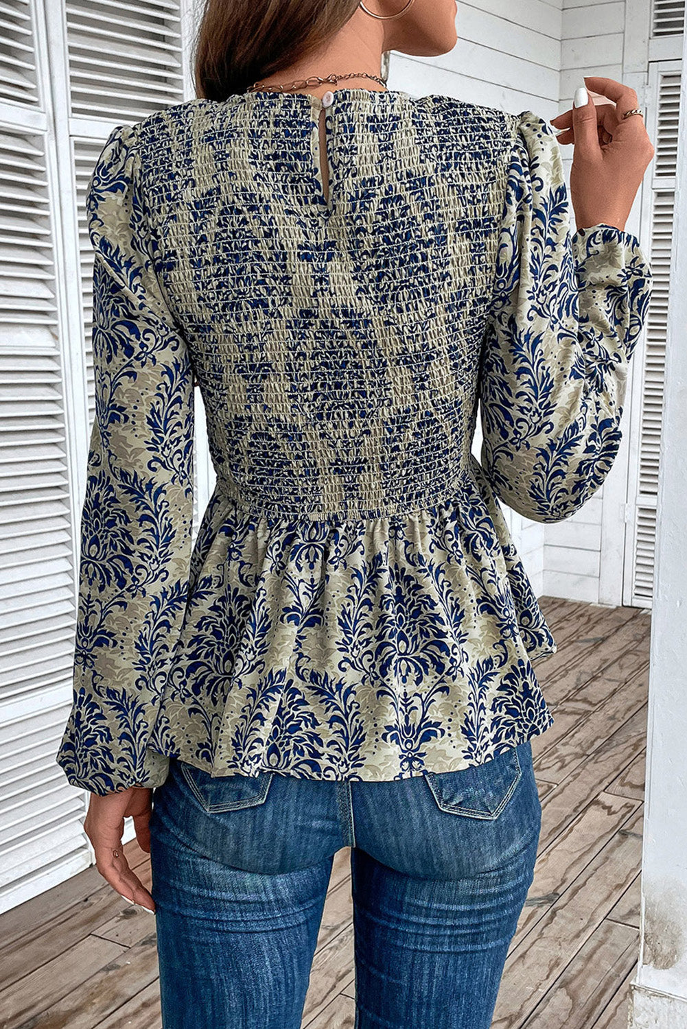 Hemelsblauwe Boho-blouse met ballonmouwen en smokwerk en peplum