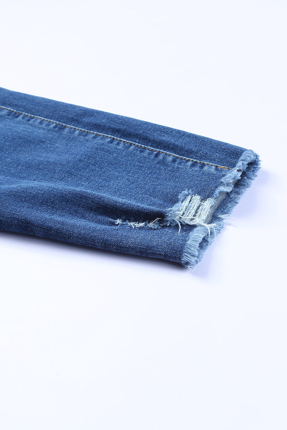 Blauwe skinny jeans met ruwe zoom tot op de enkel