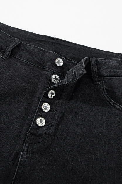 Zwarte jeans met hoge taille en knopen aan de voorkant en flared pijpen