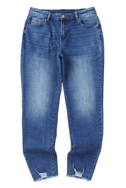 Blauwe skinny jeans met ruwe zoom tot op de enkel