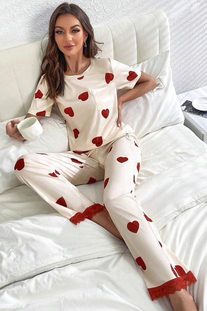 Ensemble pyjama blanc avec t-shirt et pantalon à ourlet en dentelle et imprimé cœur pour la Saint-Valentin