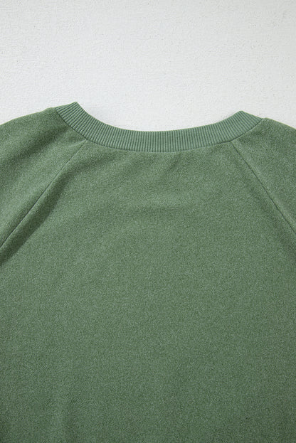 Ensemble deux pièces en polaire verte avec pull court et short