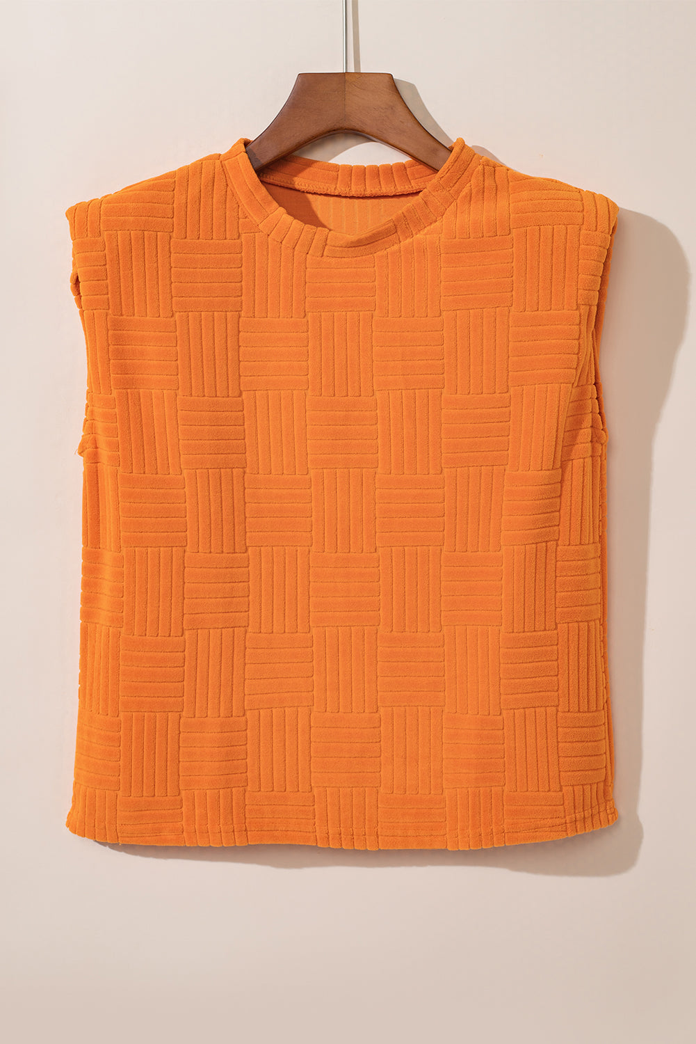 Set van oranje getextureerd tanktopje en wijde broek