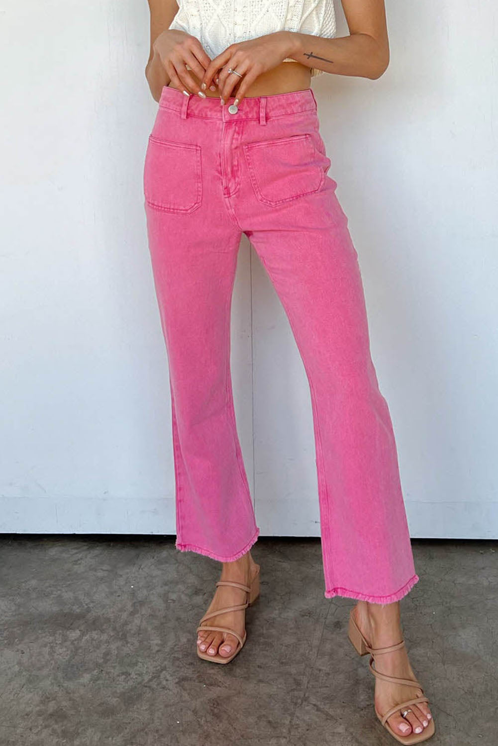 Roze enkellange flared jeans met ruwe zoom