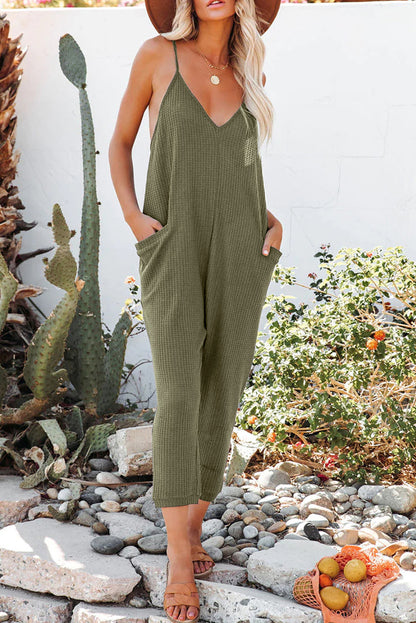 Grijze, getextureerde, mouwloze, V-hals, casual jumpsuit met zakken