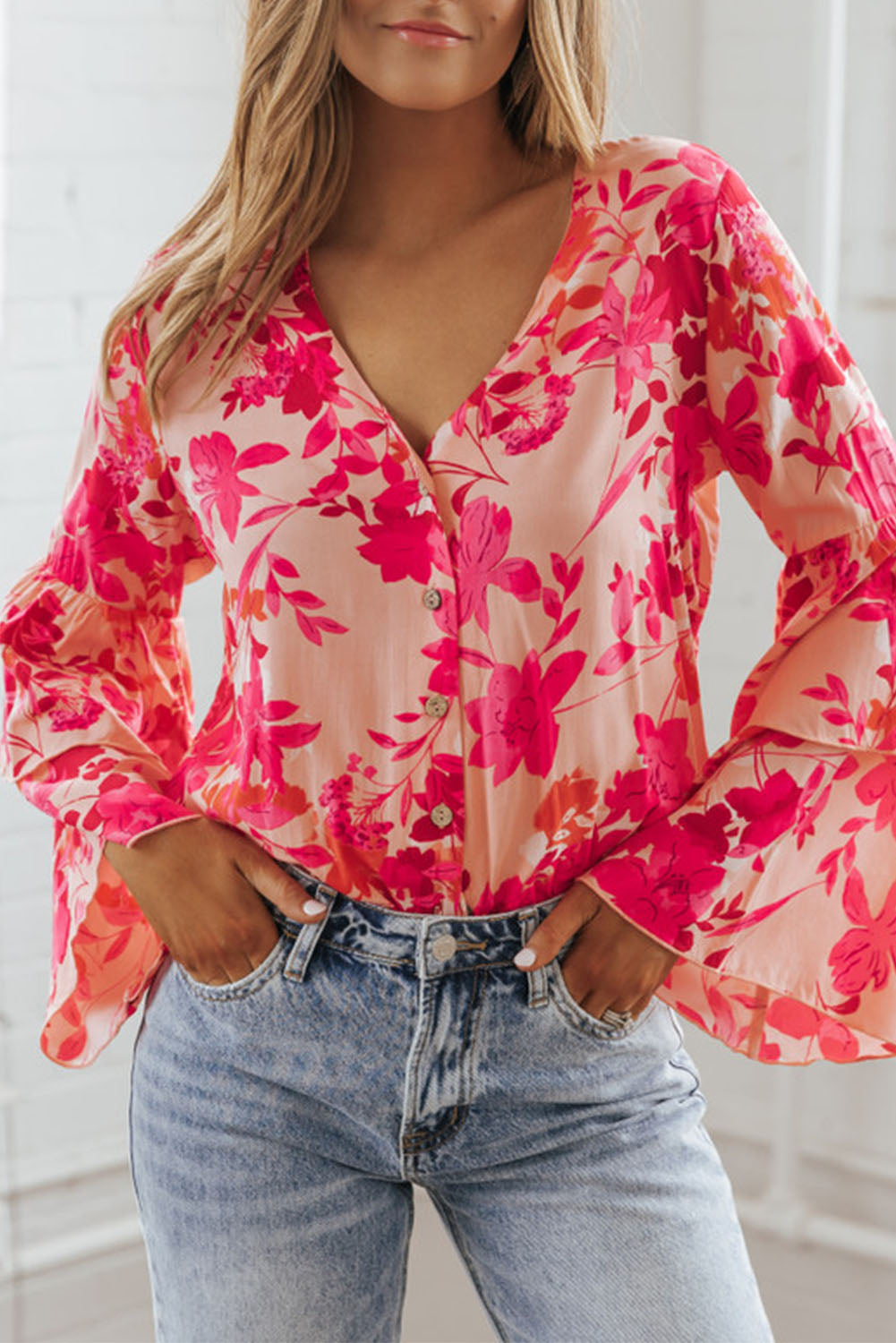 Roze bloemenprint gelaagde bel lange mouwen geknoopt bodysuit