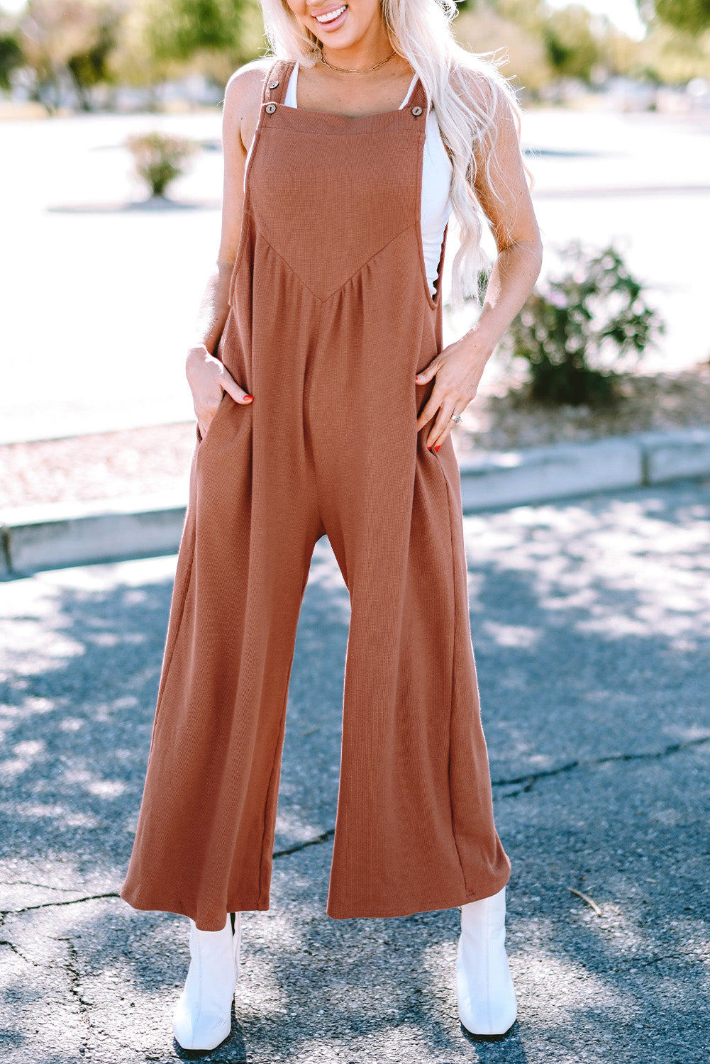 Zwarte jumpsuit met wijde pijpen en geknoopte bandjes