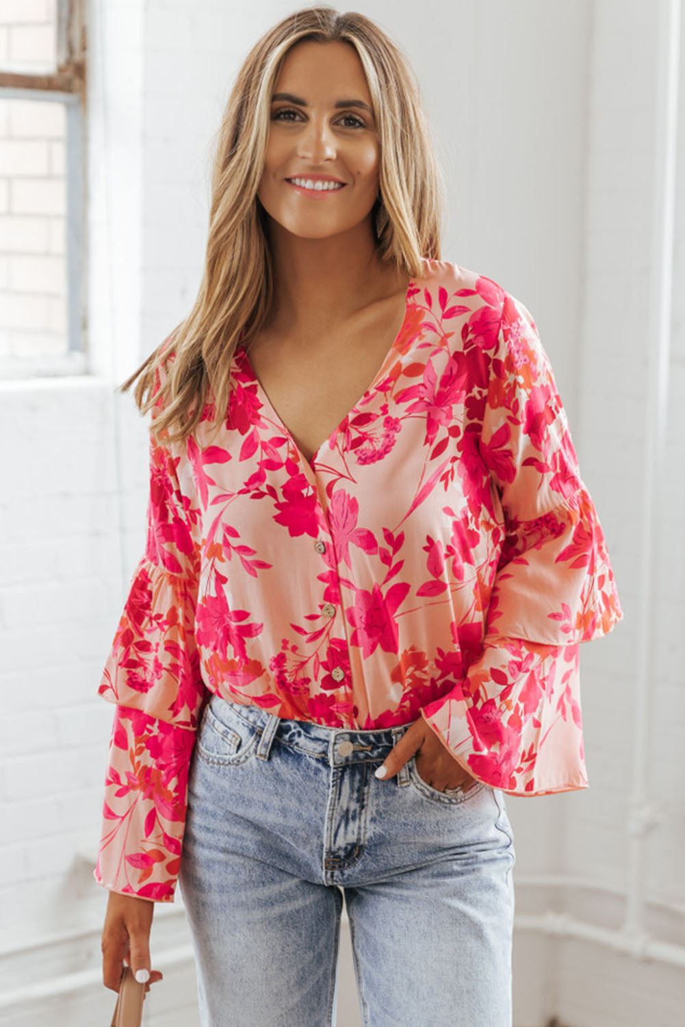 Roze bloemenprint gelaagde bel lange mouwen geknoopt bodysuit