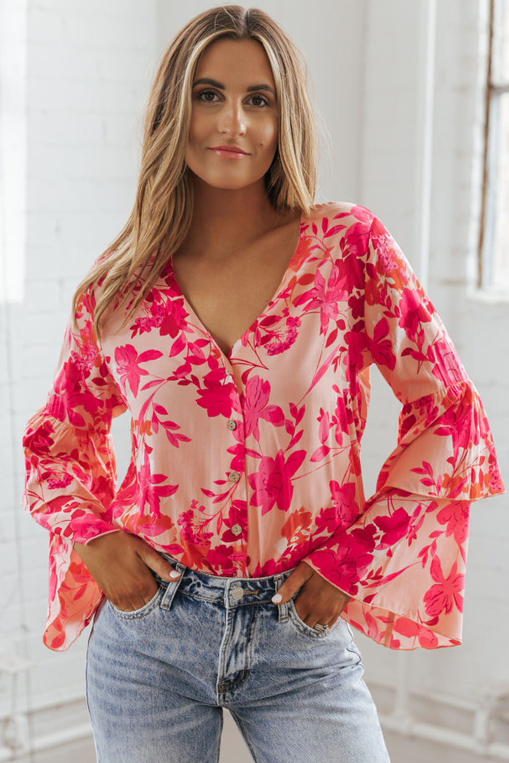 Roze bloemenprint gelaagde bel lange mouwen geknoopt bodysuit