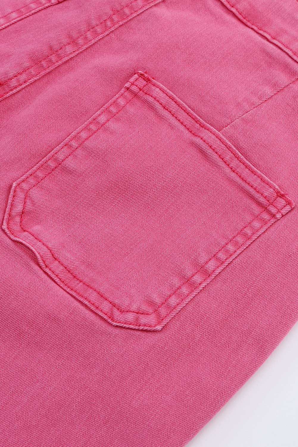 Roze enkellange flared jeans met ruwe zoom