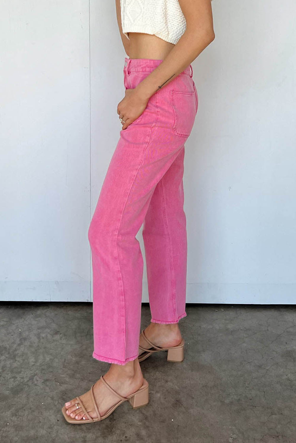 Roze enkellange flared jeans met ruwe zoom