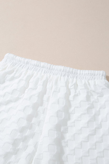 Set van witte top met splithals en trekkoordshorts