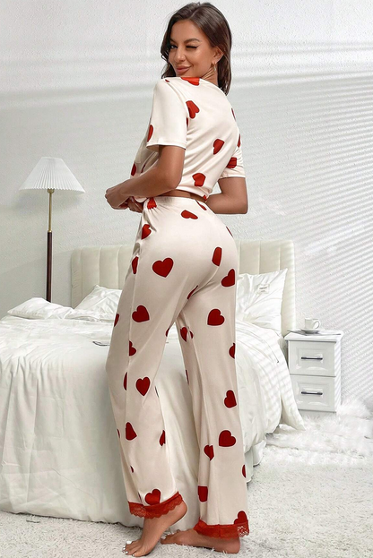 Ensemble pyjama blanc avec t-shirt et pantalon à ourlet en dentelle et imprimé cœur pour la Saint-Valentin