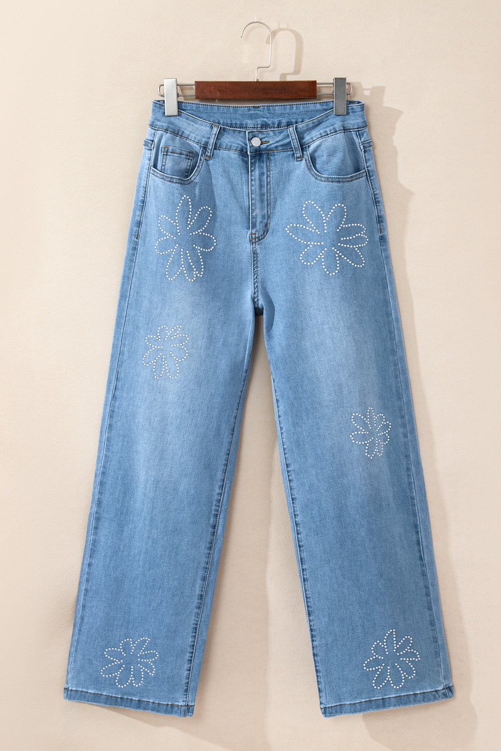 Lichtblauwe bloemen strass decor high rise wijde pijp jeans