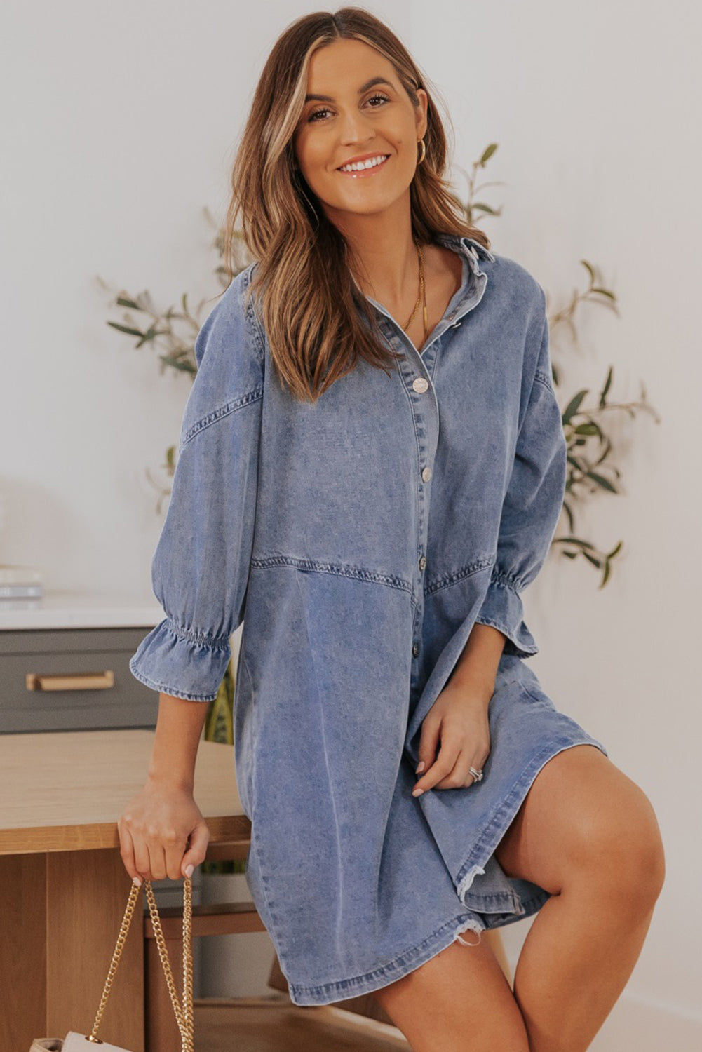 Hemelsblauwe geknoopte denim mini-jurk met lange mouwen