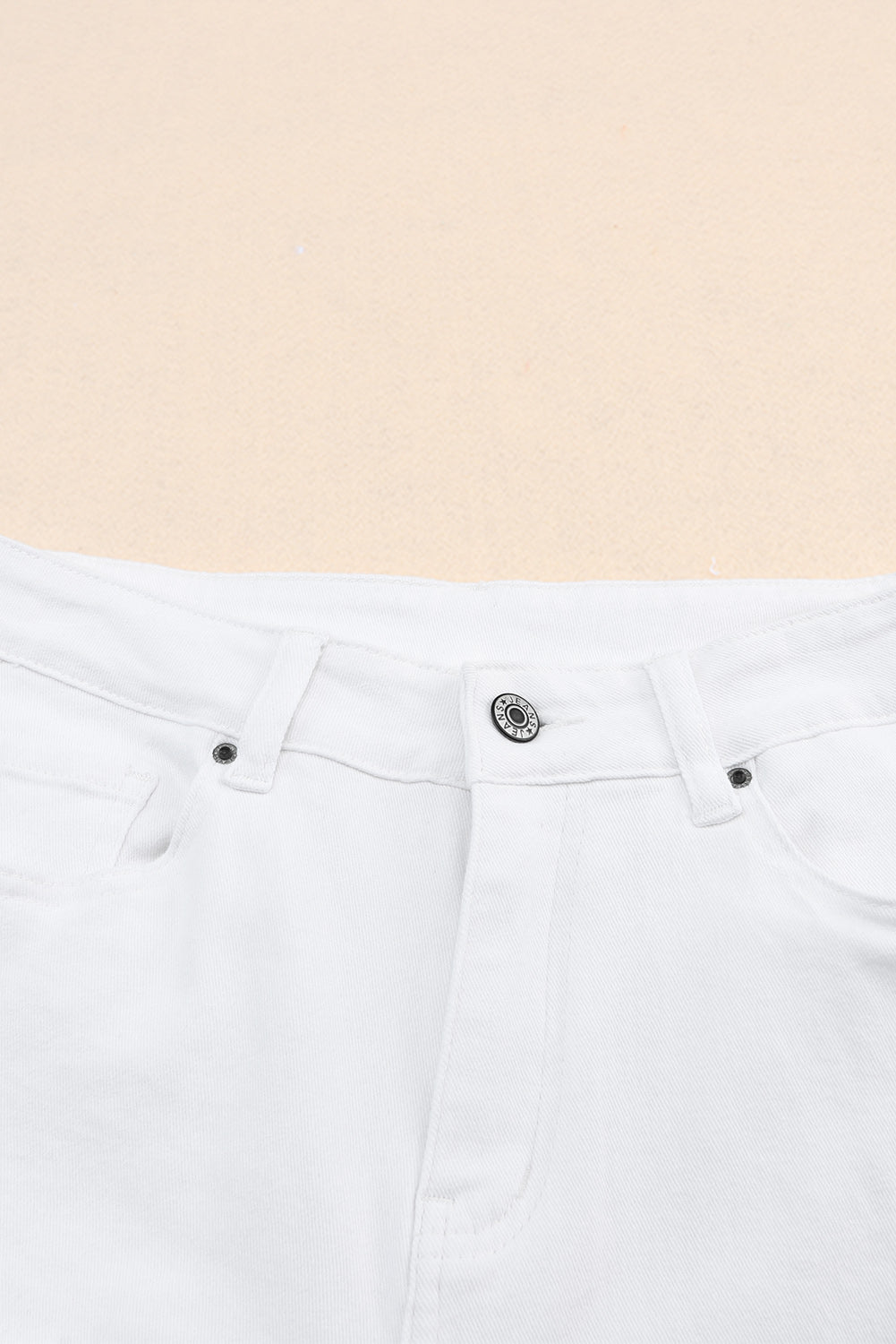 Witte gescheurde jeans met hoge taille en scheuren