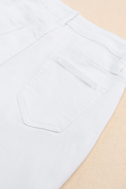 Witte gescheurde jeans met hoge taille en scheuren