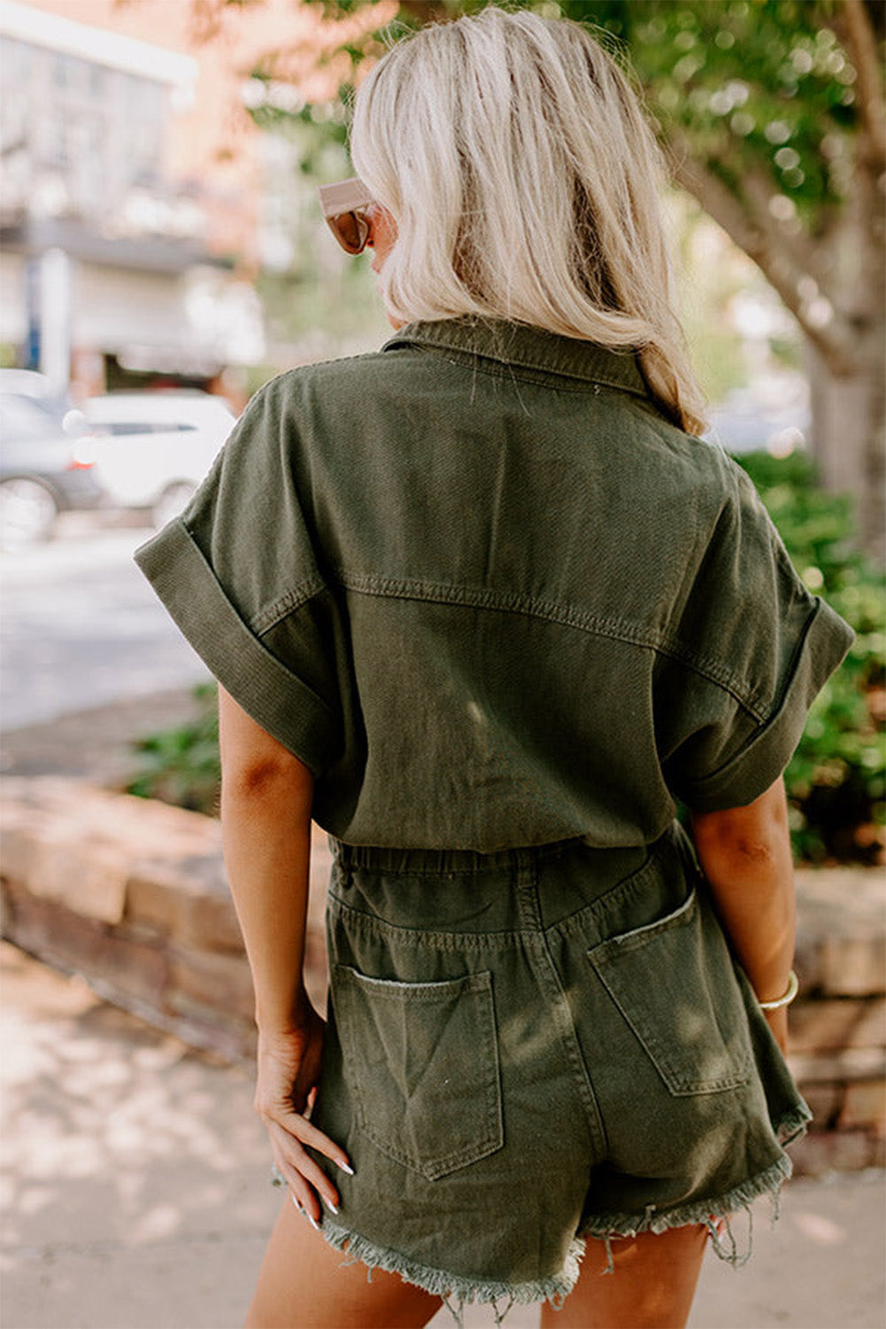 Mosgroen versleten, versleten denim rompertje