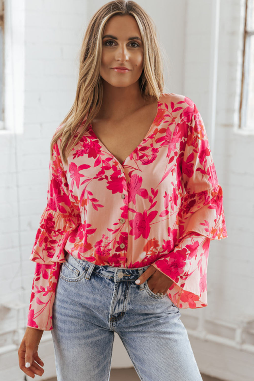 Roze bloemenprint gelaagde bel lange mouwen geknoopt bodysuit