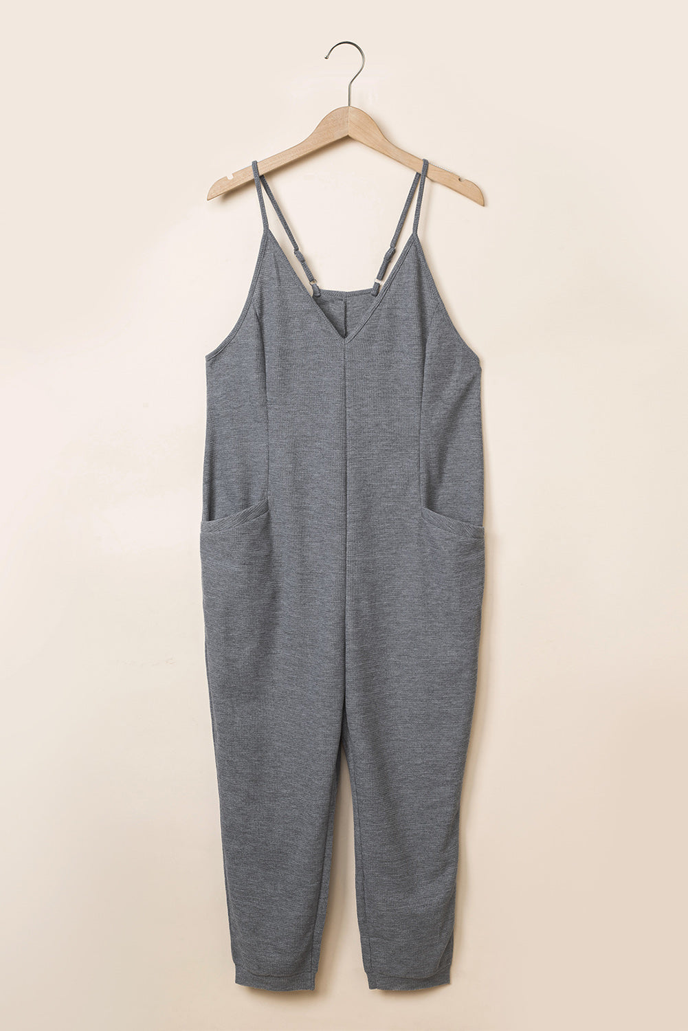 Grijze, getextureerde, mouwloze, V-hals, casual jumpsuit met zakken