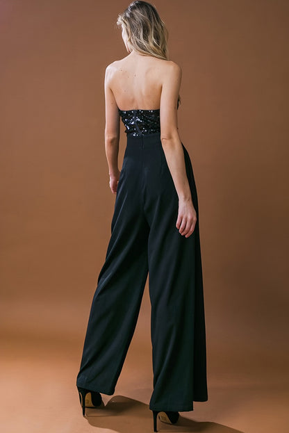 Zwarte jumpsuit met wijde pijpen en pailletten