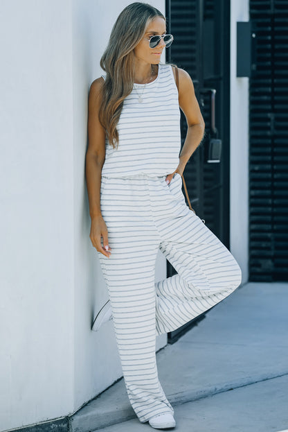 Witte gestreepte jumpsuit met zakken en mouwen