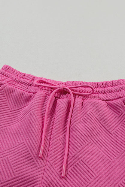 Aardbeienroze 2-delige set met effen textuur en trekkoordshorts