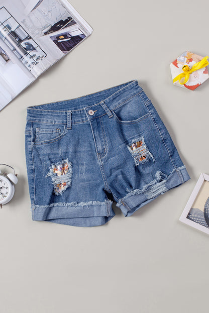 Casual denim shorts met bloemenpatchwork en opgerolde zoom