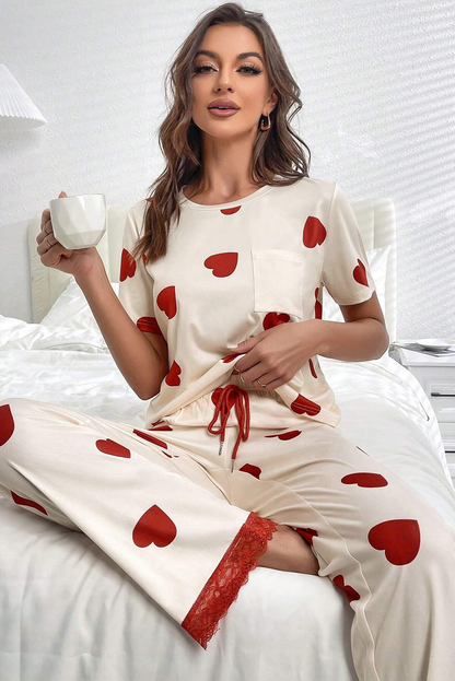 Ensemble pyjama blanc avec t-shirt et pantalon à ourlet en dentelle et imprimé cœur pour la Saint-Valentin