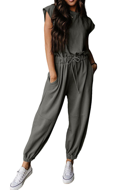 Lichte Franse beige kapmouw open rug trekkoord jogger jumpsuit