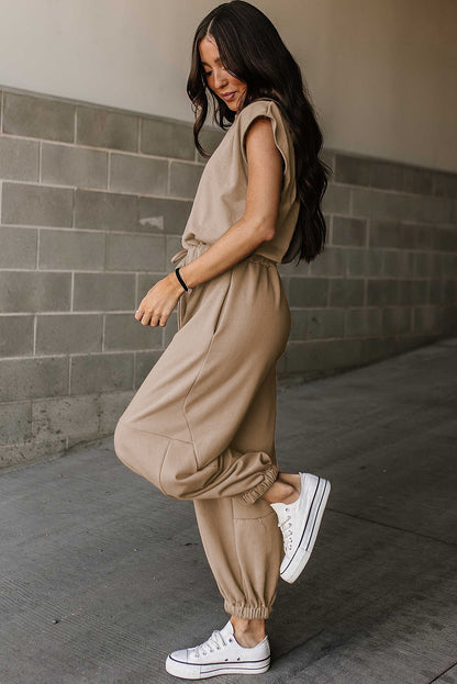 Lichte Franse beige kapmouw open rug trekkoord jogger jumpsuit