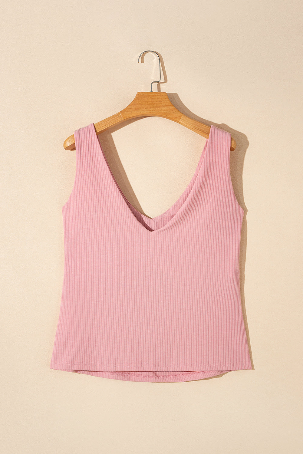 Lichtroze tanktop met ribstructuur en V-hals