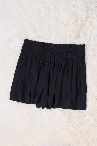 Zwarte gesmokte shorts met hoge taille