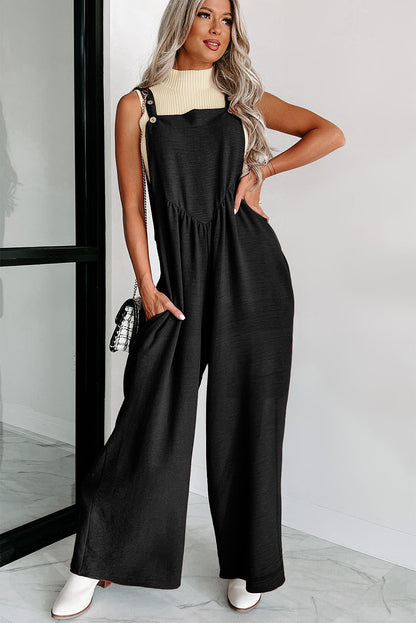 Zwarte jumpsuit met wijde pijpen en geknoopte bandjes