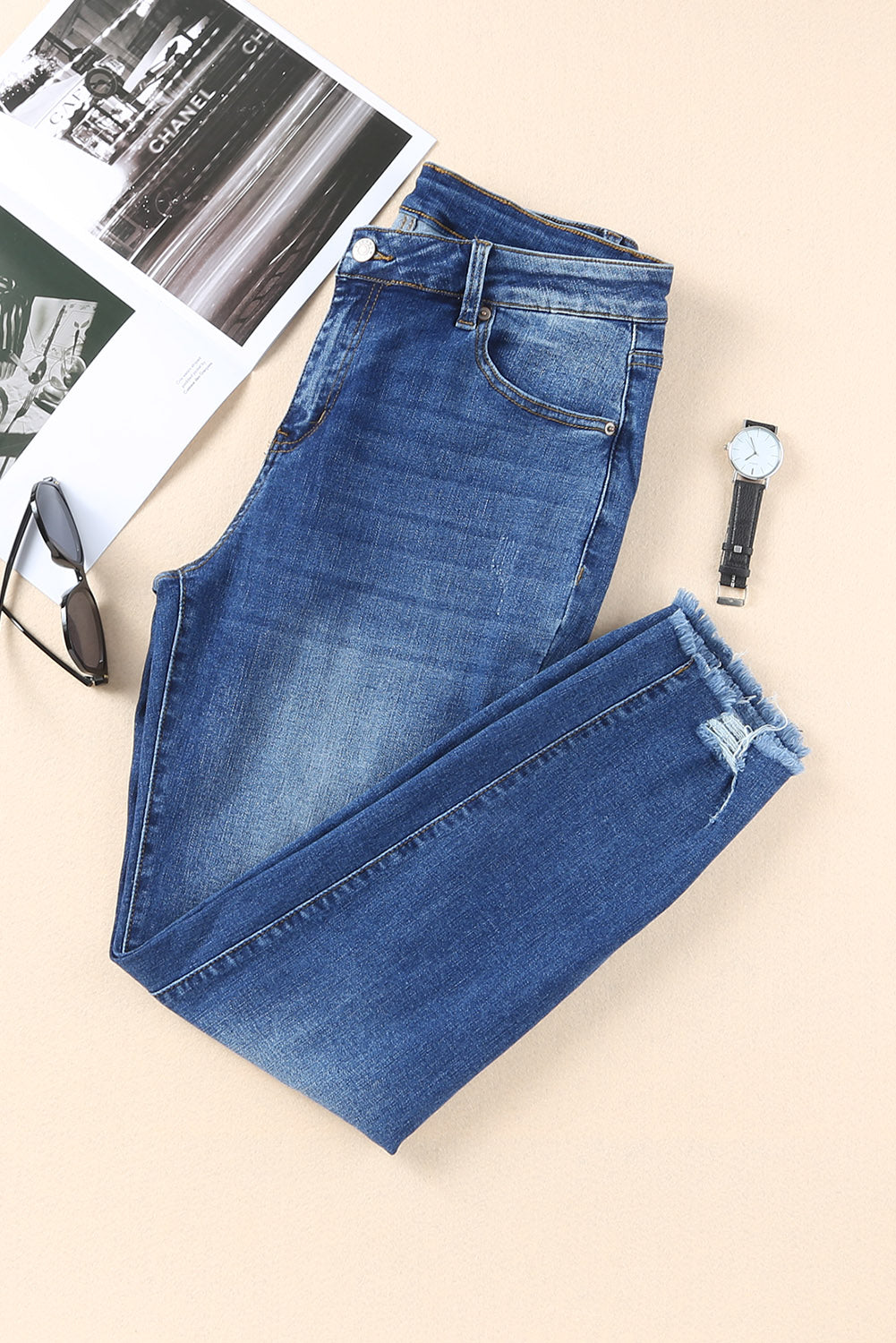 Blauwe skinny jeans met ruwe zoom tot op de enkel