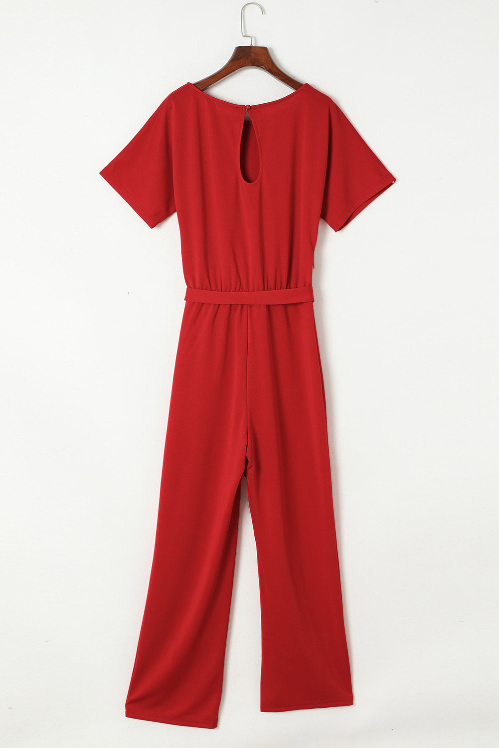 Blauwe jumpsuit met wijde pijpen en riem