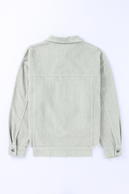 Hemelsblauwe, rauwe zoom met klepzakken en een cropped corduroy jack