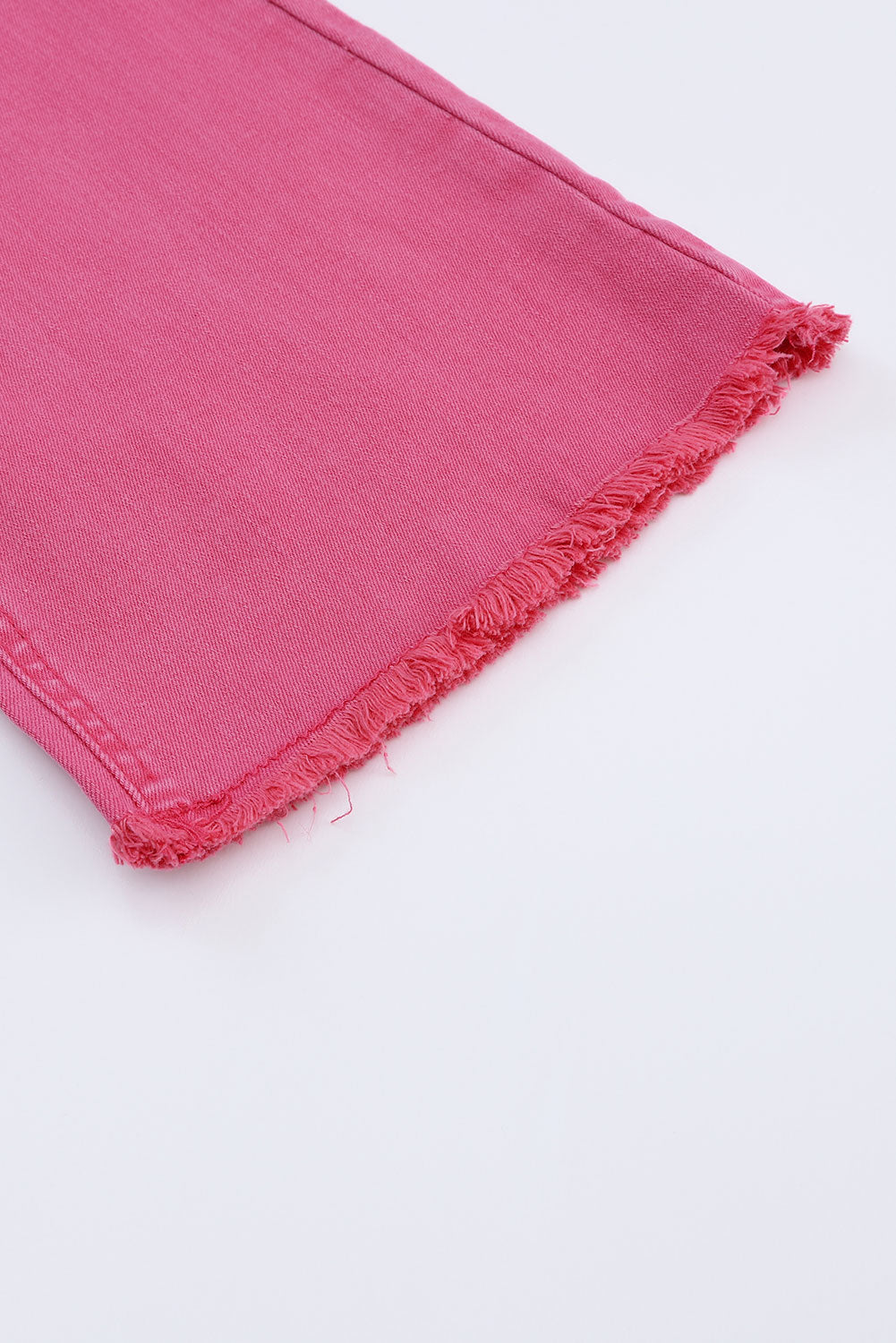 Roze enkellange flared jeans met ruwe zoom