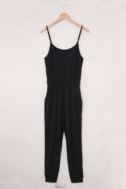 Zwarte jumpsuit met spaghettibandjes en trekkoord in de taille