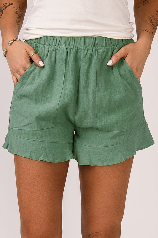 Groene shorts met hoge taille en ruches